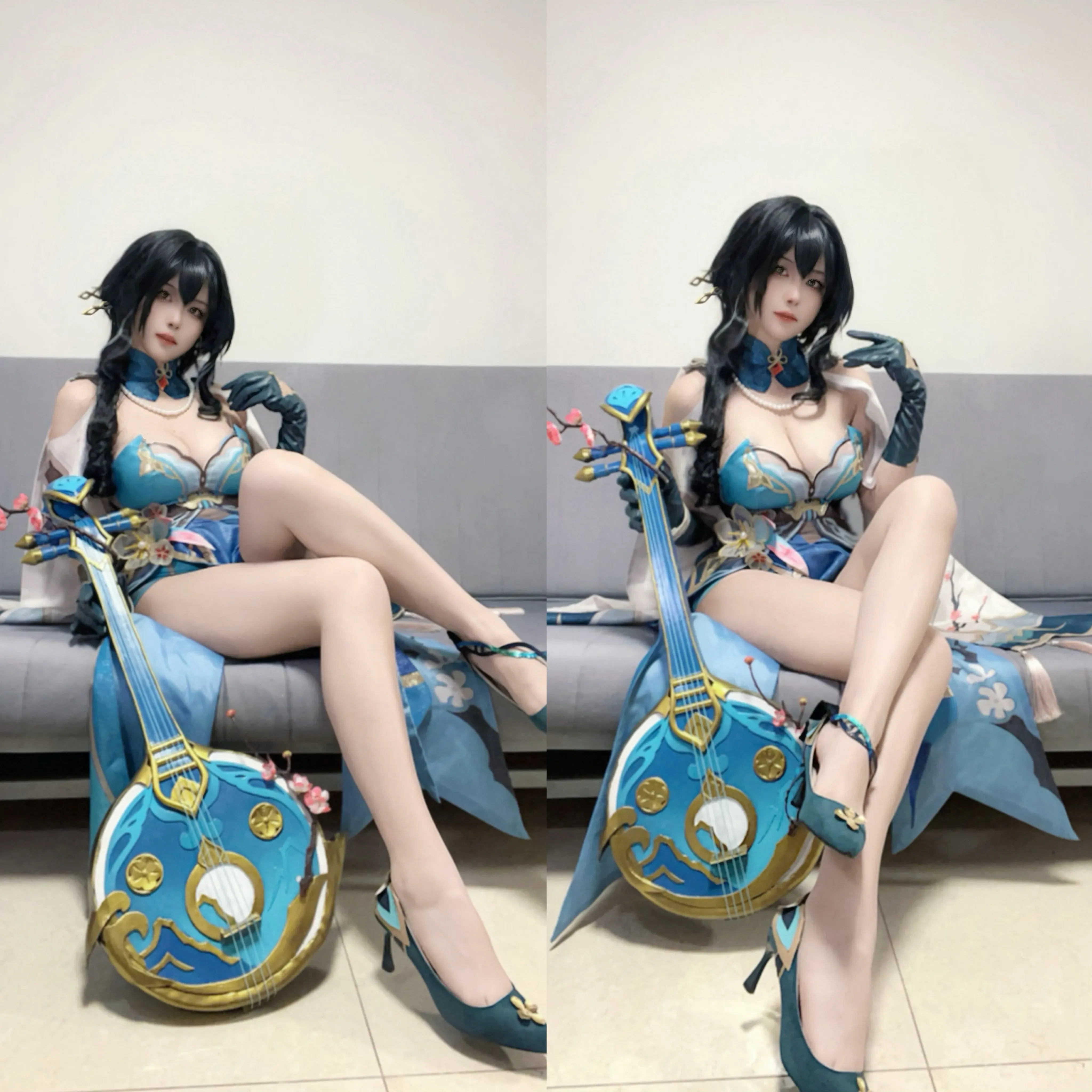 Dakki伊蓝色角色服装搭配黑色假发手持道具的Cosplay写真