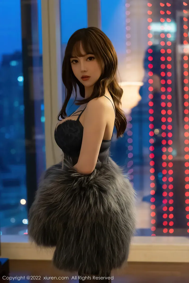 咬一口兔娘夜景窗边黑色服装照片