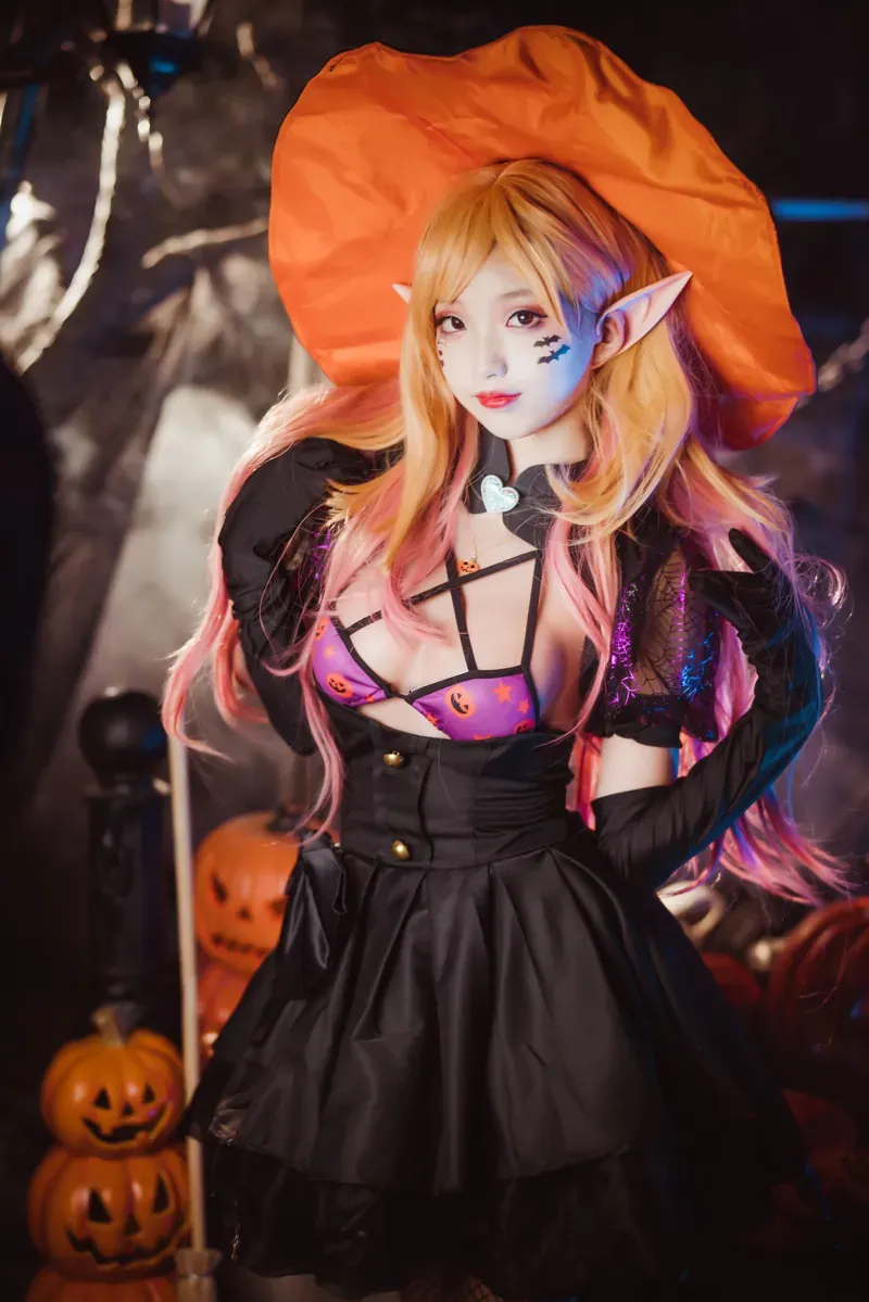 狐玖玖橙色帽子黑色服装角色造型照片